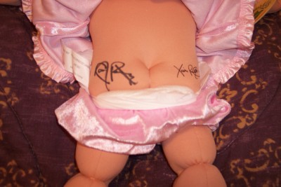 000_0009signedbutt.jpg